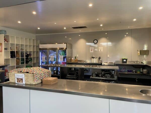 Cooking in the large well equipped kitchen at Accents YHA Hostel Nelson